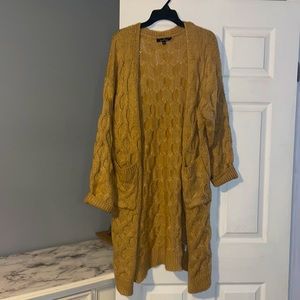 Long knit yellow sweater